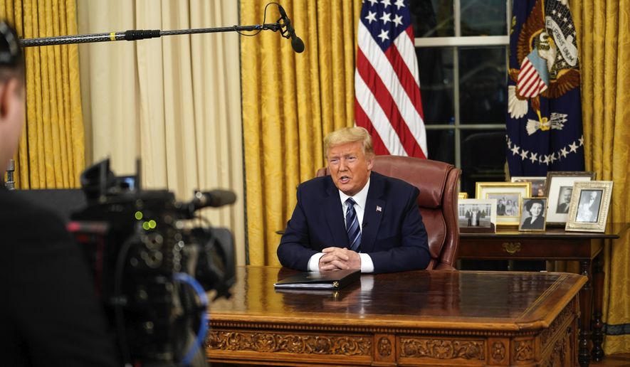 President Donald Trump speaks in an address to the nation from the Oval Office at the White House about the coronavirus Wednesday, March, 11, 2020, in Washington. (Doug Mills/The New York Times via AP, Pool)