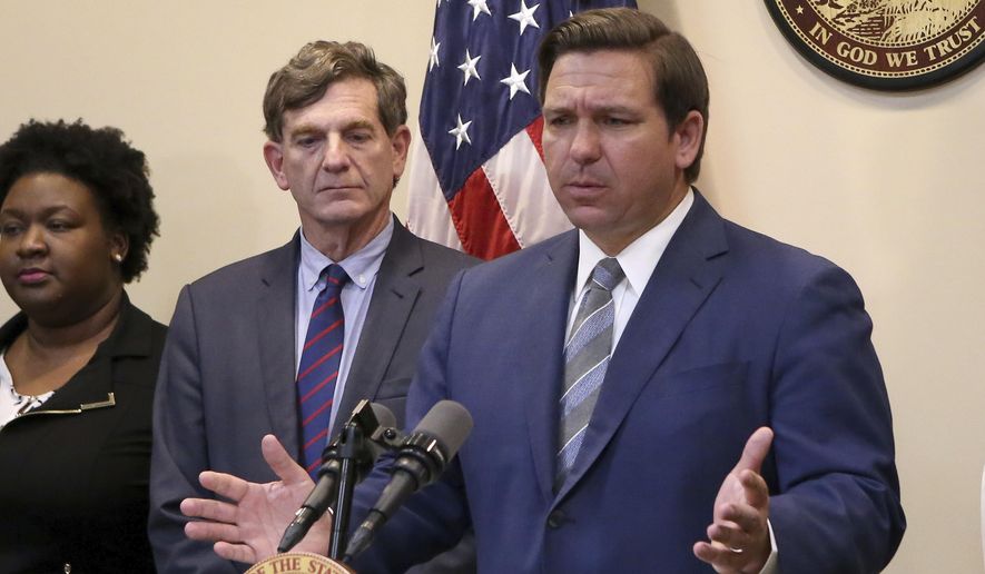 Florida Gov. Ron DeSantis speaks at a news conference about the recent coronavirus situation Wednesday March 11, 2020 in Tallahassee, Fla. For most people, the new coronavirus causes only mild or moderate symptoms. For some it can cause more severe illness. (AP Photo/Steve Cannon)