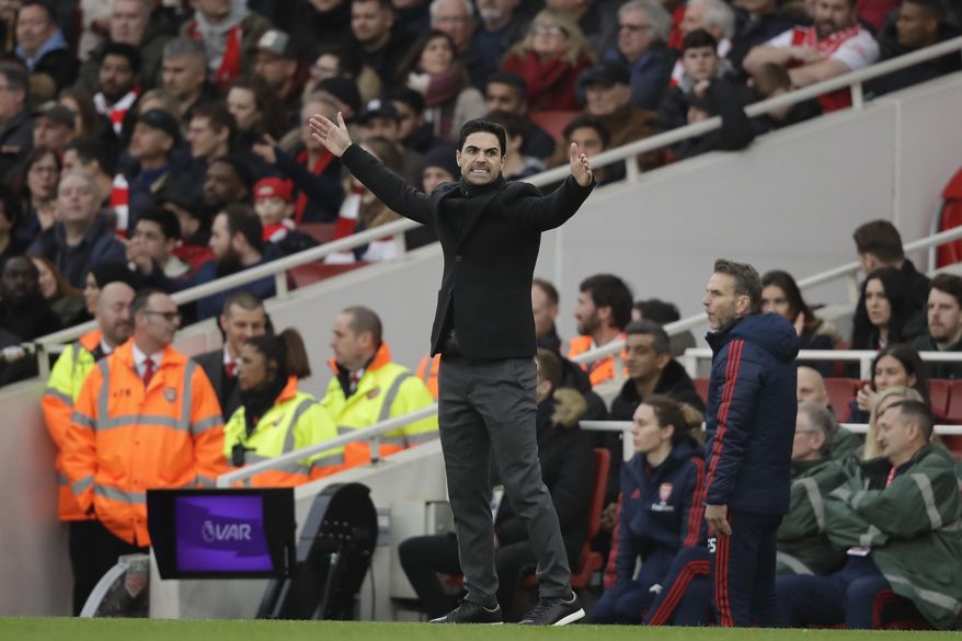 Arsenal's head coach Mikel Arteta reacts during the Premier League soccer match between Arsenal and West Ham at the Emirates Stadium in London, Saturday, March 7, 2020. Arsenal won 1-0. (AP Photo/Matt Dunham)