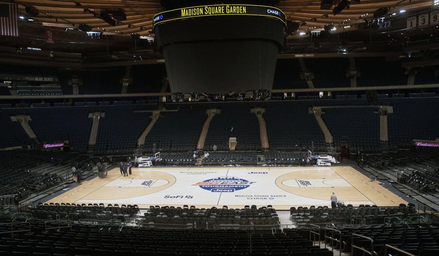 Madison Square Garden is shown after NCAA college basketball games in the men&#39;s Big East Conference tournament were cancelled due to concerns about the coronavirus, Thursday, March 12, 2020, in New York. The major conferences in college sports have all cancelled their basketball tournaments because of the new coronavirus, putting the celebrated NCAA Tournament in doubt. (AP Photo/Mary Altaffer)