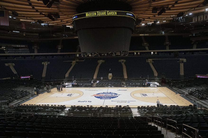Madison Square Garden is shown after NCAA college basketball games in the men&#x27;s Big East Conference tournament were cancelled due to concerns about the coronavirus, Thursday, March 12, 2020, in New York. The major conferences in college sports have all cancelled their basketball tournaments because of the new coronavirus, putting the celebrated NCAA Tournament in doubt. (AP Photo/Mary Altaffer)