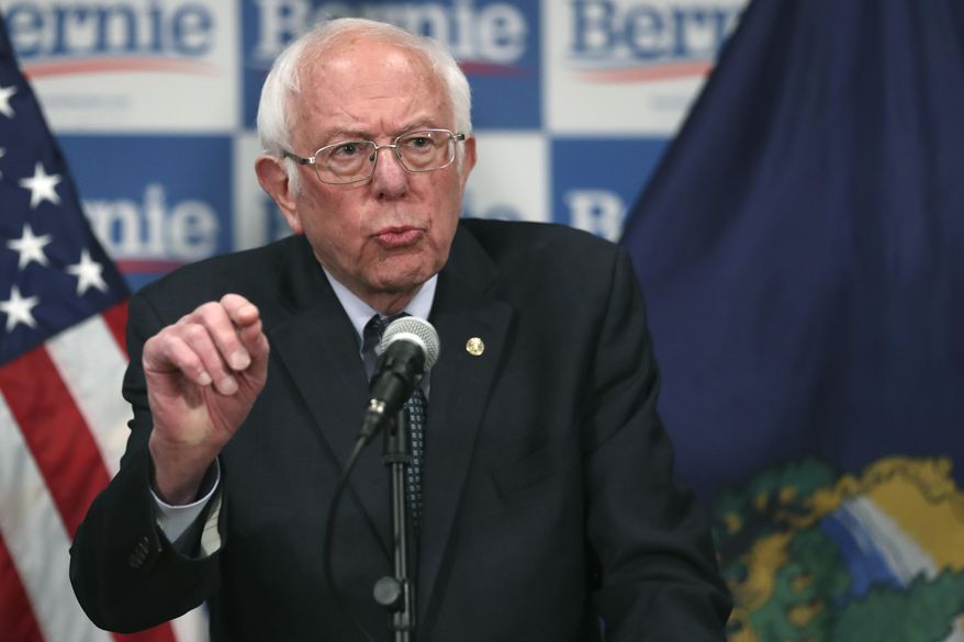 Democratic presidential candidate, Sen. Bernie Sanders, I-Vt., speaks to reporters about coronavirus Thursday March 12, 2020, in Burlington, Vt. (AP Photo/Charles Krupa)