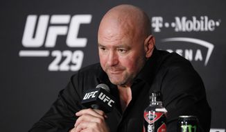 In this Oct. 6, 2018, file photo, Dana White, president of the UFC, speaks at a news conference after the UFC 229 mixed martial arts event in Las Vegas. The UFC is determined to fight on amid the worldwide coronavirus outbreak. The UFC hasn&#39;t canceled any competitions, even those previously scheduled for areas where large gatherings are now banned. White attributes his decision to go against the sports world&#39;s collective mindset partly to a conversation Thursday, March 12, 2020, with President Donald Trump and Vice President Mike Pence.  (AP Photo/John Locher, File)  **FILE**