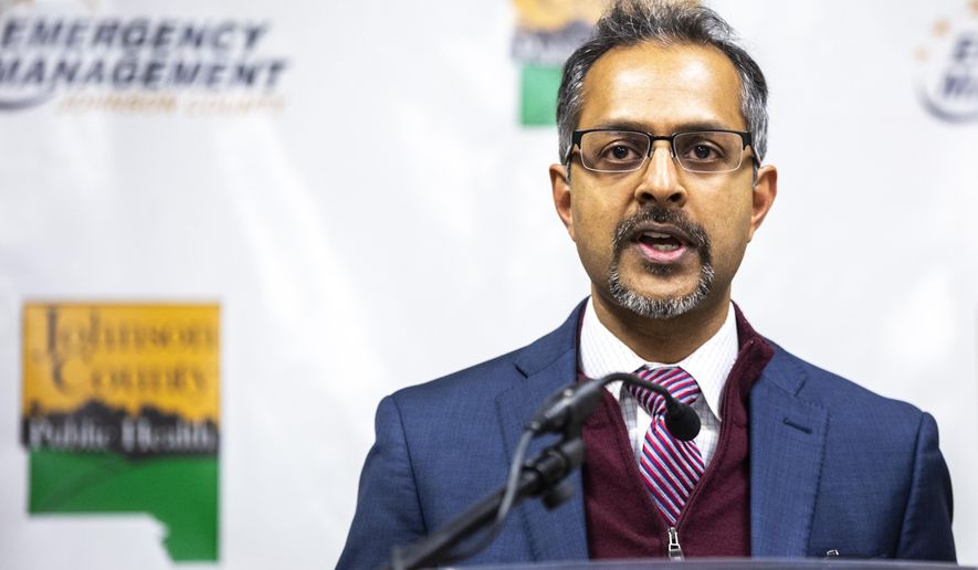 Suresh Gunasekaran, University of Iowa Hospitals and Clinics CEO, speaks during a press conference providing an update on the coronavirus, Friday, March 13, 2020, at the Johnson County Emergency Operations Center in Iowa City, Iowa. The vast majority of people recover from the new coronavirus. According to the World Health Organization, most people recover in about two to six weeks, depending on the severity of the illness. (Joseph Cress/Iowa City Press-Citizen via AP)