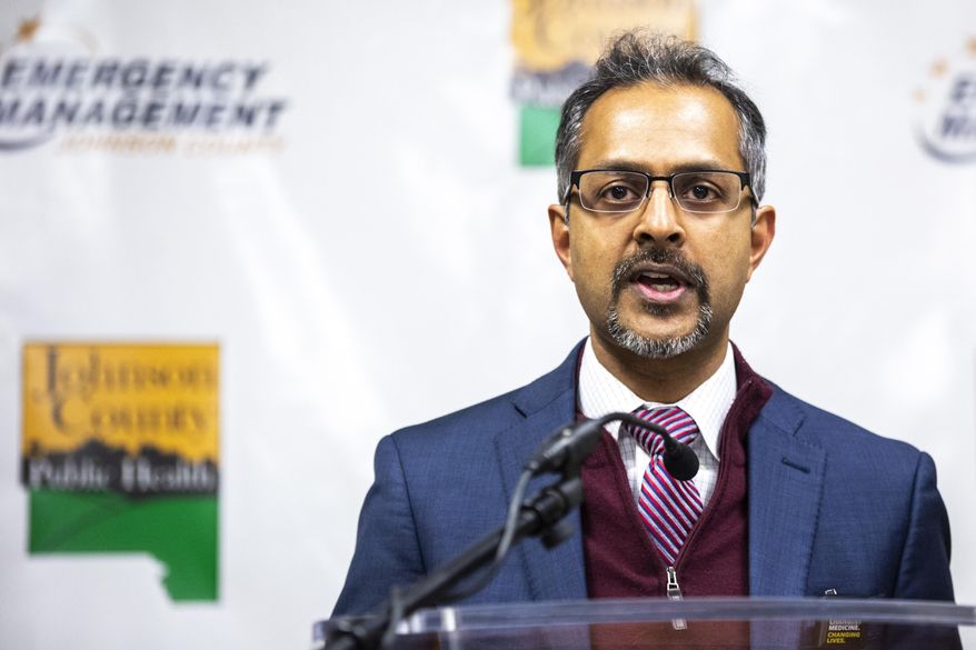 Suresh Gunasekaran, University of Iowa Hospitals and Clinics CEO, speaks during a press conference providing an update on the coronavirus, Friday, March 13, 2020, at the Johnson County Emergency Operations Center in Iowa City, Iowa. The vast majority of people recover from the new coronavirus. According to the World Health Organization, most people recover in about two to six weeks, depending on the severity of the illness. (Joseph Cress/Iowa City Press-Citizen via AP)
