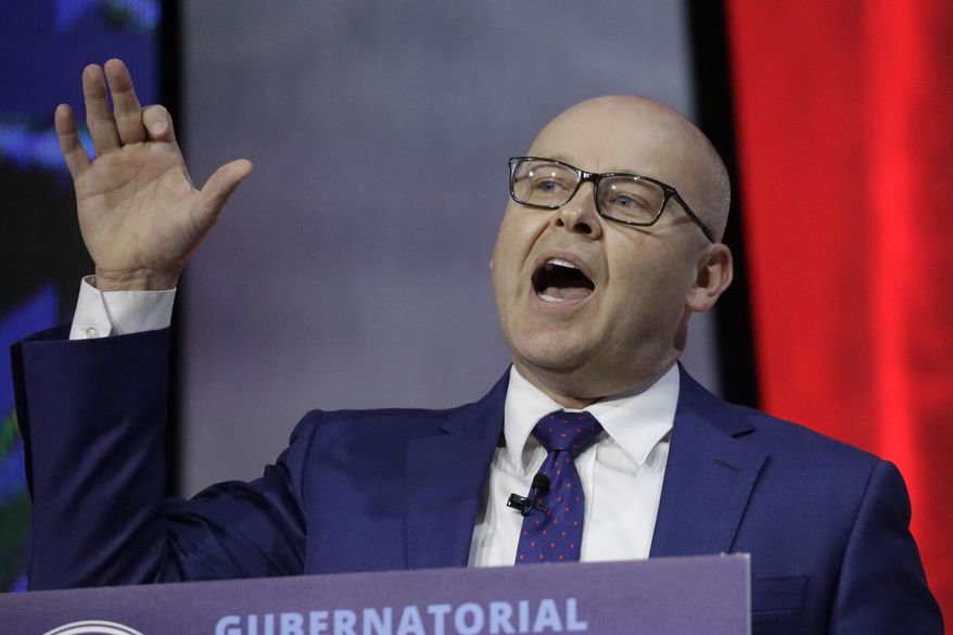 FILE - In this Jan. 31, 2020, file photo, Businessman Jeff Burningham speaks during a debate for Utah's 2020 gubernatorial race in Salt Lake City. Gubernatorial candidate Burningham suspended his effort to gather signatures to qualify for the primary ballot, with the Republican saying he "couldn't sleep" thinking about potential spread knocking on hundreds of doors a day. (AP Photo/Rick Bowmer, File)