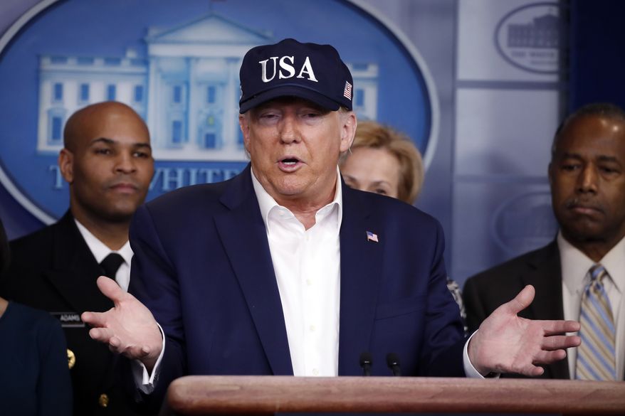 President Donald Trump speaks during briefing on coronavirus in the Brady press briefing room at the White House, Saturday, March 14, 2020, in Washington, as U.S. Surgeon General Jerome Adams, Dr. Deborah Birx, White House coronavirus response coordinator, and Housing and Urban Development Secretary Ben Carson, listen. (AP Photo/Alex Brandon)