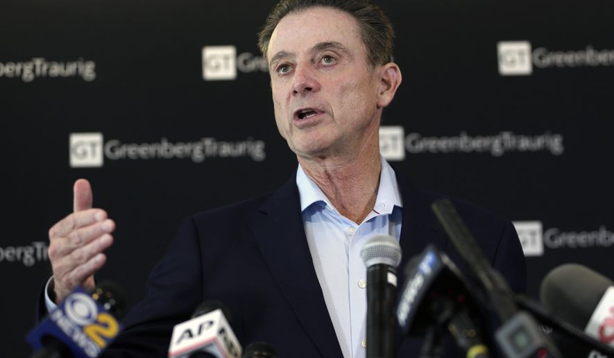 FILE - In this Feb. 21, 2018, file photo, former Louisville basketball coach Rick Pitino appears during a news conference in New York. Hall of Famer Pitino was named basketball coach at Iona College on Saturday, March 14, 2020. Pitino coached at Louisville from 2001-17 before being fired in a pay-for-play scandal and had been coaching in Greece. He replaces Tim Cluess, who resigned Friday after 10 years and six NCAA Tournament appearances due to health concerns. (AP Photo/Seth Wenig, File)