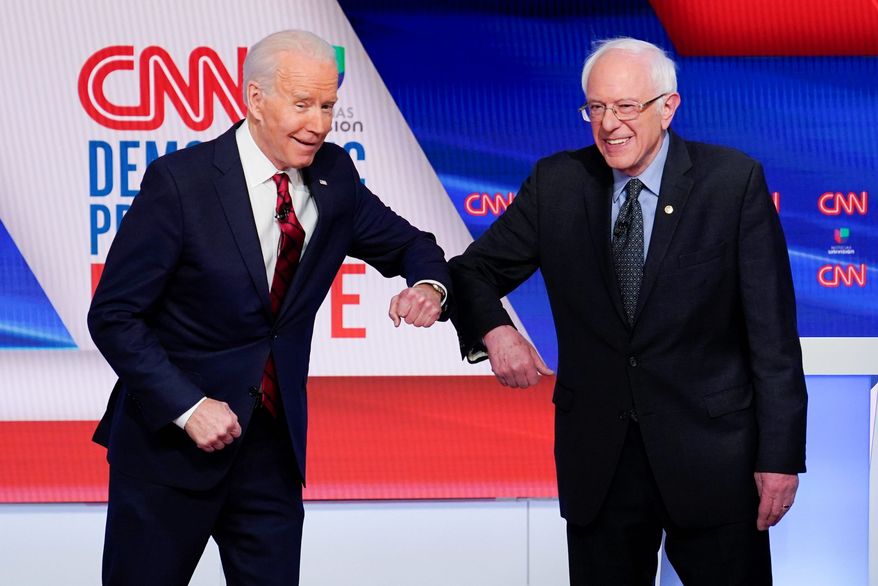 Former Vice President Joseph R. Biden (left), and Sen. Bernard Sanders squabbled like schoolchildren at Sunday&#39;s Democratic debate. (Associated Press)