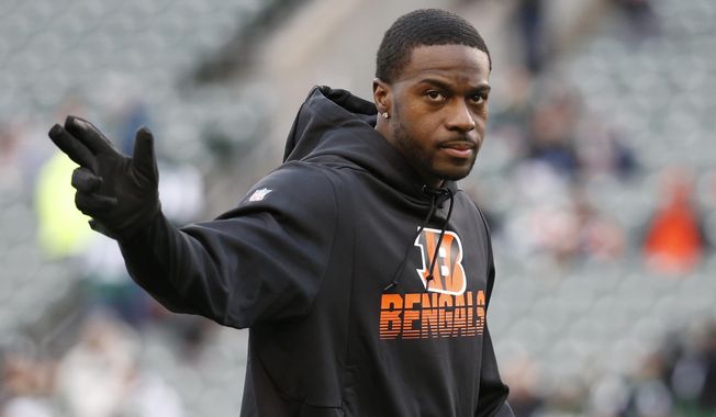 FILE - In this Dec. 1, 2019, file photo, Cincinnati Bengals wide receiver A.J. Green practices before an NFL football game against the New York Jets in Cincinnati. The Bengals used their franchise tag on A.J. Green, giving them time to try to work out a long-term deal with the star who is one of the most accomplished receivers in franchise history and would be a vital part of breaking in a new quarterback.(AP Photo/Frank Victores, File)
