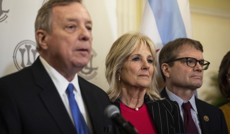 Former Second Lady of the United States Jill Biden and U.S. Rep. Mike Quigley, right, look on as U.S. Sen. Dick Durbin endorses former Vice President Joe Biden during a press conference at the Union League Club, Friday, March 6, 2020. (Ashlee Rezin Garcia/Chicago Sun-Times via AP)