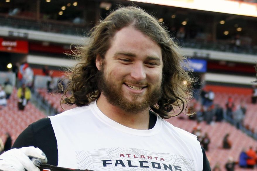 FILE - In this Nov. 11, 2018, file photo, Atlanta Falcons offensive tackle Ty Sambrailo is shown after an NFL football game in Cleveland. The Atlanta Falcons are releasing running back Devonta Freeman and three more veterans to clear salary cap room. The Falcons also will release cornerback Desmond Trufant and have announced they have cut offensive tackle Ty Sambrailo and tight end Luke Stocker. Freeman and Trufant are former Pro Bowl players who had been considered foundation players for the franchise.(AP Photo/Ron Schwane, File)
