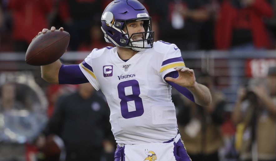 FILE - In this Jan. 11, 2020, file photo, Minnesota Vikings quarterback Kirk Cousins (8) passes against the San Francisco 49ers during the first half of an NFL divisional playoff football game in Santa Clara, Calif. The Minnesota Vikings and quarterback Kirk Cousins have agreed to a two-year contract extension, his agent Mike McCartney said Monday, March 16, 2020.(AP Photo/Marcio Jose Sanchez, File)