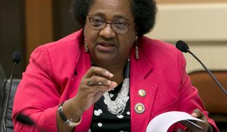 FILE - In this Aug. 23, 2017, file photo Assemblywoman Shirley Weber, D-San Diego, speaks during a joint legislative hearing in Sacramento, Calif. A spokesman for the 71-year-old Weber, announced that she would miss Monday&#39;s Assembly session &amp;quot;adhering to the recommendation set forth from for the governor. &amp;quot; On Sunday Gov. Gavin Newsom urged the state&#39;s 5.3. million people 65 and older to stay at home. (AP Photo/Rich Pedroncelli, File)