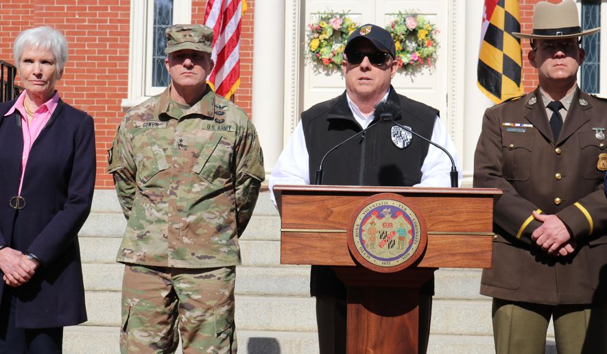 Maryland Gov. Larry Hogan announces an order to close bars, restaurants, gyms and move theaters in the state in response to coronavirus during a news conference at the governor's mansion on Monday, March 16, 2020 in Annapolis, Md. From left is Deputy Health Secretary Fran Phillips, Maj. Gen. Timothy Gowen, the adjutant general of the Maryland National Guard, Hogan, and Superintendent of the Maryland State Police Woodrow Jones. (AP Photo/Brian Witte)