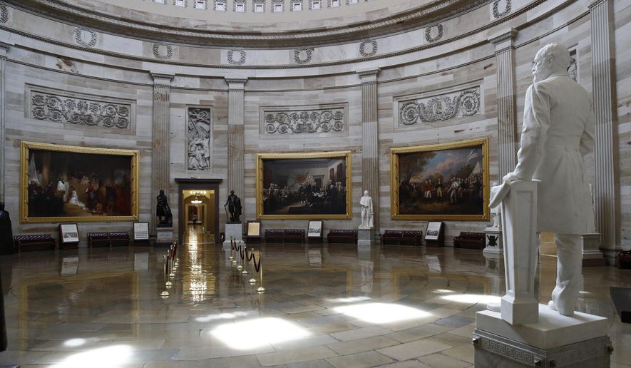 The U.S. Capitol Rotunda sits empty on Capitol Hill in Washington, Monday, March 16, 2020. Congress has shut the Capitol and all Senate and House office buildings to the public until April in reaction to the spread of the coronavirus outbreak. (AP Photo/Patrick Semansky)