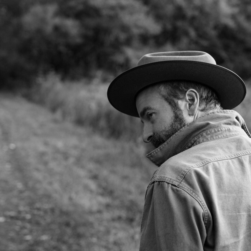 This cover image released by Thirty Tigers shows "Red Tail," a release by Dave Simonett. (Thirty Tigers via AP)