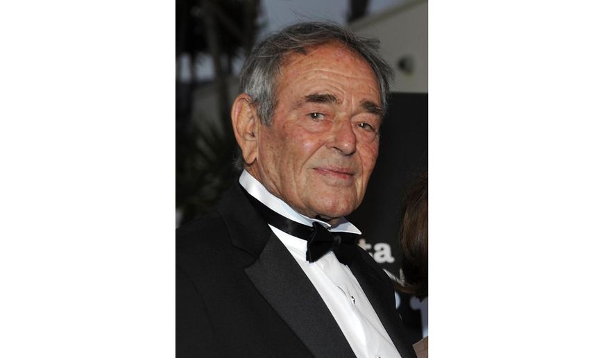 FILE - In this Oct. 2, 2008 file photo, actor Stuart Whitman arrives at the Santa Barbara International Film Festival black-tie gala fundraiser in Santa Barbara, Calif. Whitman, who appeared in hundreds of films and television shows, died Monday in Montecito, Calif. at 92. (AP Photo/Phil Klein, file)
