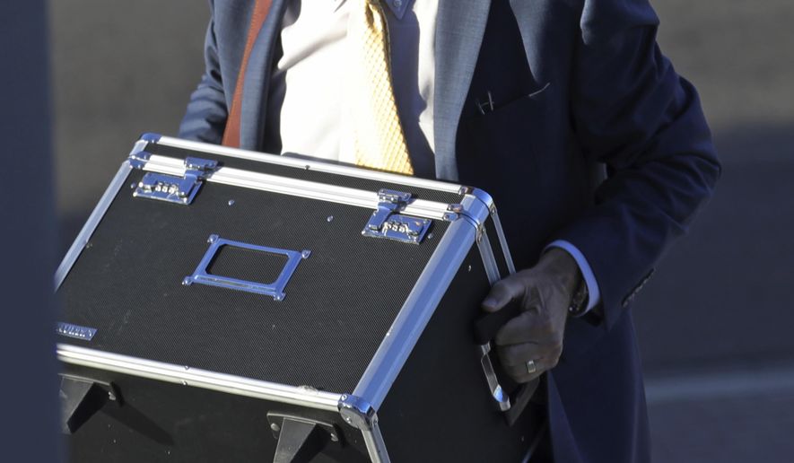 FILE - In this Aug. 23, 2019, file photo, defense attorney Greg Skordas arrives at federal courthouse, in Salt Lake City. New candidates are joining the race for Utah Attorney General, including a high-profile defense attorney and a reform-minded county prosecutor. Defense attorney and former prosecutor Skordas announced his candidacy Tuesday, March 17, 2020, days after Utah County Attorney David O. Leavitt said he would challenge Republican Sean Reyes for the job. (AP Photo/Rick Bowmer, File)