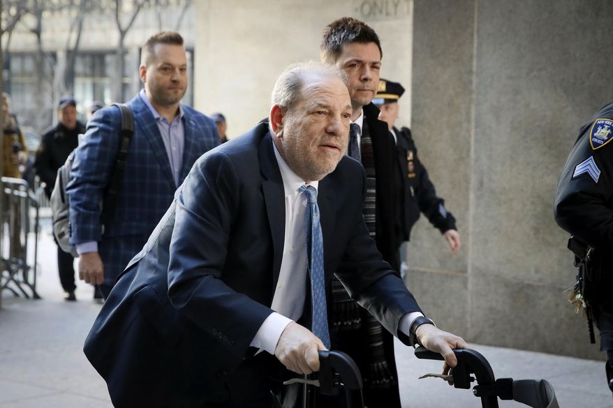 FILE- In this Feb. 24, 2020 file photo, Harvey Weinstein arrives at a Manhattan courthouse as jury deliberations continue in his rape trial in New York. Weinstein was transferred to a state prison in New York on Wednesday, March 18, as he begins to serve a 23-year sentence for rape and sexual assault in his landmark #MeToo case. (AP Photo/John Minchillo, File)