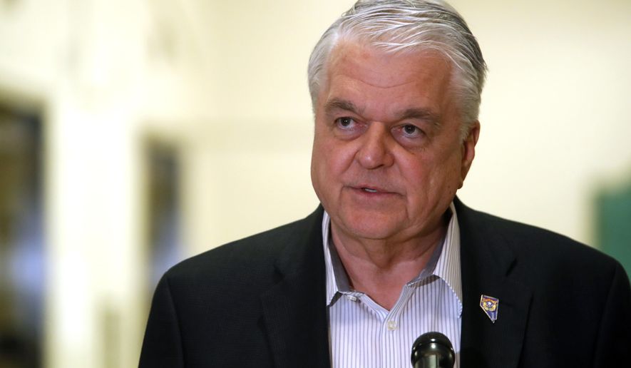 Nevada Gov. Steve Sisolak speaks during a news conference at the Sawyer State Building in Las Vegas,Tuesday, March 17, 2020. Sisolak ordered a monthlong closure of casinos and other non-essential businesses in order to stem the spread of the new coronavirus (COVID-19). (Steve Marcus/Las Vegas Sun via AP)