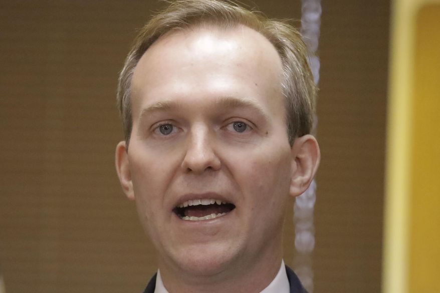 In this Dec. 16, 2019, photo Utah Rep. Ben McAdams speaks during a news conference in Murray, Utah. McAdams tested positive for the coronavirus on Wednesday, March 18, 2020, in an announcement that comes shortly after the first known case in Congress. (AP Photo/Rick Bowmer) **FILE**