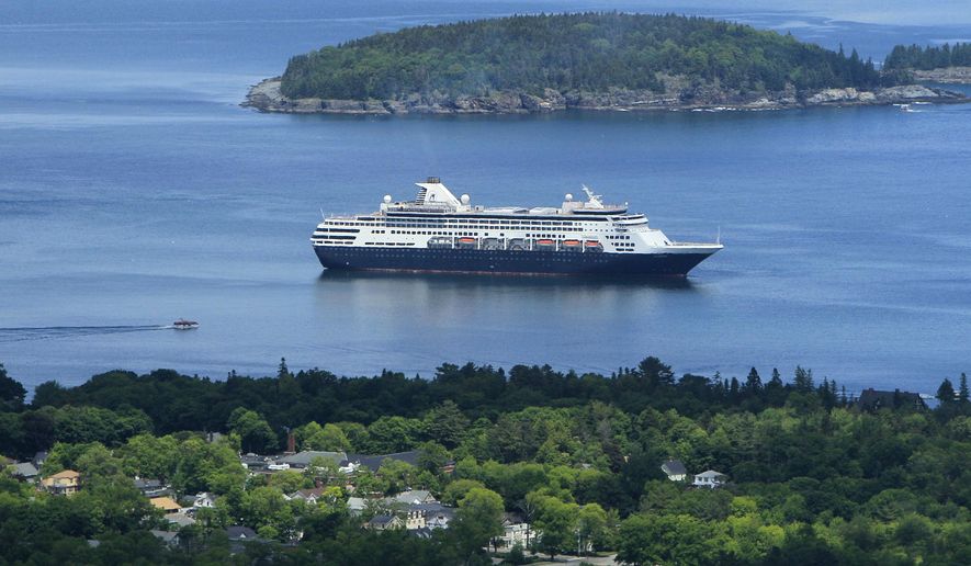 FILE - In this June 4, 2010, file photo, the Maasdam, a 1258-passenger cruise ship, sits at anchor in Frenchman's Bay off Bar Harbor, Maine. Two cruise ships were headed Wednesday, March 18, 2020, to Honolulu after being turned away by other ports. There were no positive cases of coronavirus on either vessel, officials said. The ships are the Maasdam, operated by Holland America Line, and the Norwegian Jewel, owned by Norwegian Cruise Line. (AP Photo/Robert F. Bukaty, File)