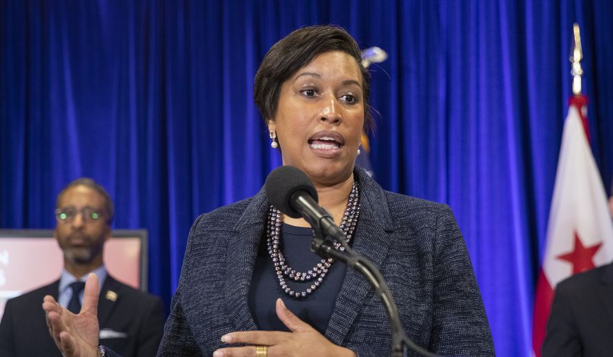District of Columbia Mayor Muriel Bowser speaks to reporters about coronavirus during a news conference, Friday, March 20, 2020, in Washington. District of Columbia announced Friday its first COVID-19 death. (AP Photo/Manuel Balce Ceneta) ** FILE **