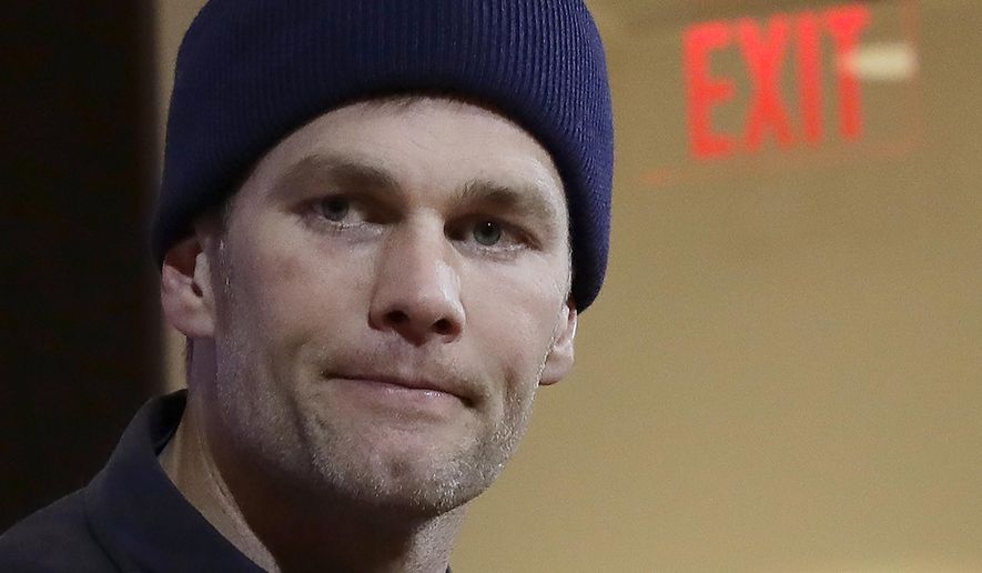 FILE - In this Jan. 4, 2020, file photo, New England Patriots quarterback Tom Brady listens to a question at his post-game news conference after the Patriots lost to the Tennessee Titans in an NFL wild-card playoff football game in Foxborough, Mass. Brady said on social media, Friday, March 20, 2020, he has signed with with the Tampa Bay Buccaneers. (AP Photo/Elise Amendola, File)