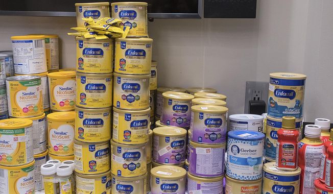 In this Saturday, Jan. 5, 2019, file photo, different kinds of baby formula line a shelf in Mankato, Minn. (Jackson Forderer/The Free Press via AP) ** FILE **