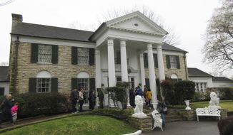Visitors get ready to tour Graceland in Memphis, Tenn. *FILE* (AP Photo/Beth J. Harpaz)