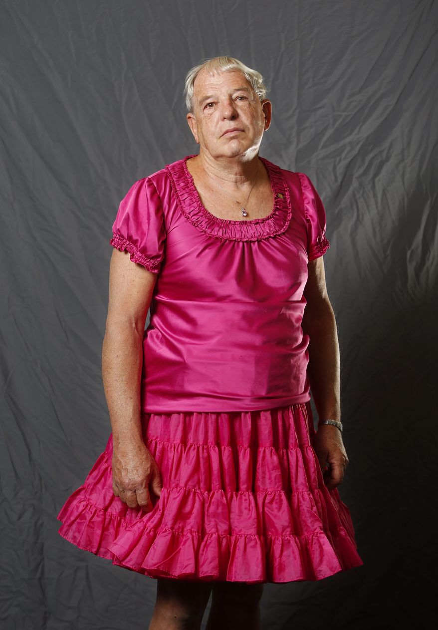 File-This April 26, 2017, file photo shows Larry "Sissy" Goodwin posing for a portrait in Casper, Wyo. Goodwin, a Vietnam veteran and retired educator from Douglas who gained national attention for being a Wyoming man who dressed in women’s clothing, died March 7 from stage IV brain cancer. He was 73. (Alan Rogers/The Casper Star-Tribune via AP, File)