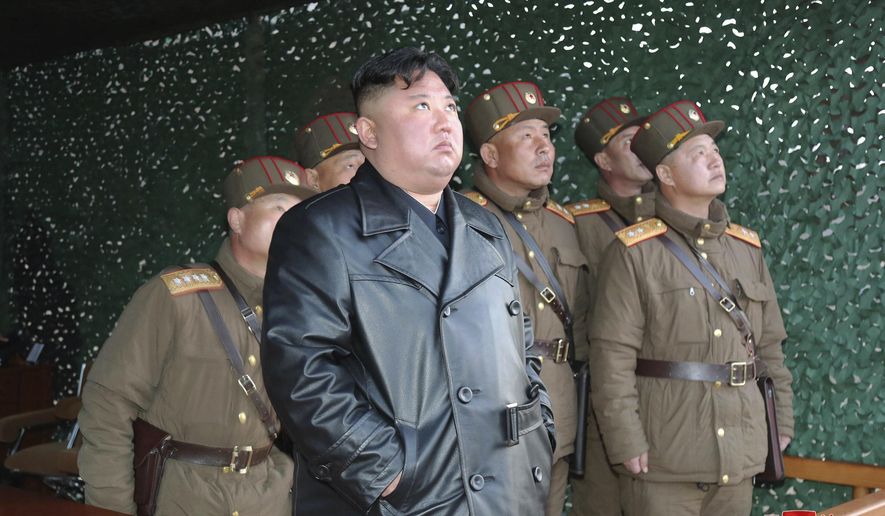 In this photo provided by the North Korean government, North Korean leader Kim Jong Un inspects military exercise at an undisclosed location in North Korea on Saturday, March 21, 2020. Independent journalists were not given access to cover the event depicted in this image distributed by the North Korean government. The content of this image is as provided and cannot be independently verified. Korean language watermark on image as provided by source reads: "KCNA" which is the abbreviation for Korean Central News Agency. (Korean Central News Agency/Korea News Service via AP)