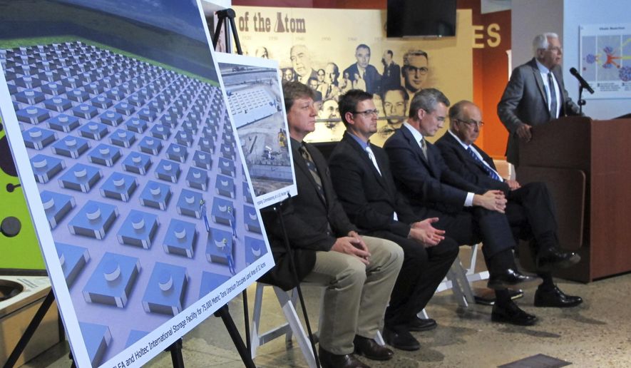 FILE - In this April 29, 2015, file photo, an illustration depicts a planned interim storage facility for spent nuclear fuel in southeastern New Mexico as officials announce plans to pursue the project during a news conference at the National Museum of Nuclear Science and History in Albuquerque, N.M. Federal regulators are recommending licensing a proposed multibillion-dollar complex in southern New Mexico that would temporarily store spent fuel from commercial nuclear reactors around the United States. But the preliminary recommendation of the Nuclear Regulatory Commission is making waves with critics who say the agency did not look closely enough at potential conflicts with locating the facility in the heart of one of the nation&#39;s busiest oil and gas basins. (AP Photo/Susan Montoya Bryan, File)