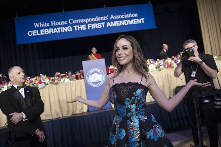 Shira Lazar has a moment of fun with photographers during the White House Correspondents' Dinner in Washington, Saturday, April 29, 2017. (AP Photo/Cliff Owen)