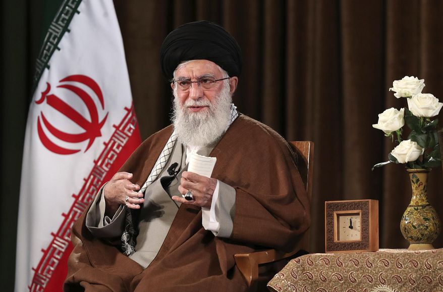 In this picture released by the official website of the office of the Iranian supreme leader, Supreme Leader Ayatollah Ali Khamenei addresses the nation on a televised speech, in Tehran, Iran, Sunday, March 22, 2020. Iran's supreme leader Sunday refused U.S. assistance to fight the new coronavirus, citing an unfounded conspiracy theory that the virus could be man-made by America. (Office of the Iranian Supreme Leader via AP) **FILE**