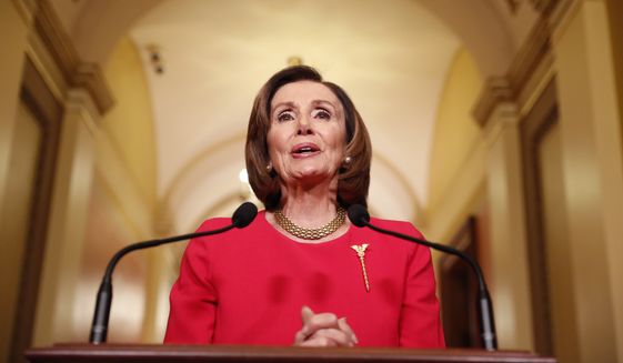 House Speaker Nancy Pelosi of California speaks outside her office on Capitol Hill, Monday, March 23, 2020. (AP Photo/Andrew Harnik, Pool)