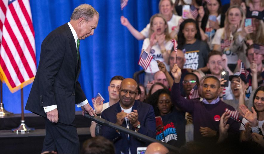 Former Democratic presidential candidate Mike Bloomberg leaves after speaking to supporters as he announces the suspension of his campaign and his endorsement of former Vice President Joe Biden for president in New York Wednesday , March 4, 2020. (AP Photo/Eduardo Munoz Alvarez)