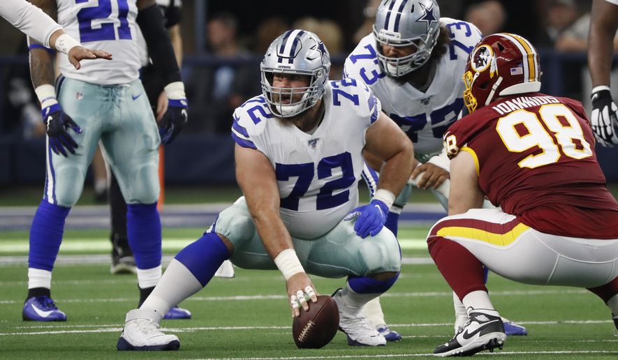 In this Dec. 15, 2019, photo, Dallas Cowboys center Travis Frederick (72) plays in the first half of an NFL football game against the Washington Redskins in Arlington, Texas. Frederick is retiring from the NFL at 29. The surprising decision comes less than two years after Frederick was diagnosed with a neurological disorder that sidelined him for all of 2018. (AP Photo/Roger Steinman)