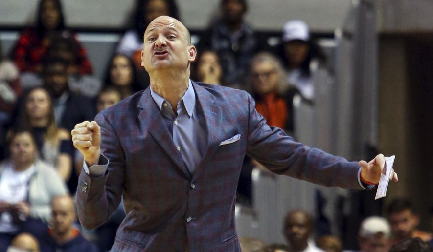 FILE - In this Jan. 9, 2018, file photo, Mississippi head coach Andy Kennedy reacts to a call during the first half of an NCAA college basketball game against Auburn in Auburn, Ala. UAB has hired former Mississippi coach Andy Kennedy to lead its basketball program. The Blazers announced Kennedy's return to his alma mater on Friday, March 20, 2020. A two-time Southeastern Conference coach of the year and the Rebels' winningest coach, Kennedy remains the second-leading scorer in UAB program history.(AP Photo/Butch Dill, File)