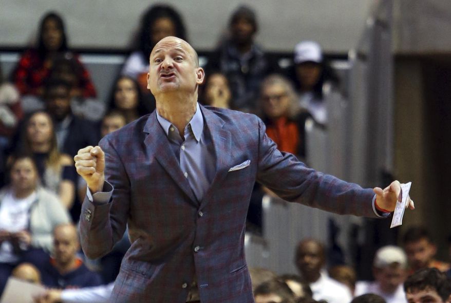 FILE - In this Jan. 9, 2018, file photo, Mississippi head coach Andy Kennedy reacts to a call during the first half of an NCAA college basketball game against Auburn in Auburn, Ala. UAB has hired former Mississippi coach Andy Kennedy to lead its basketball program. The Blazers announced Kennedy's return to his alma mater on Friday, March 20, 2020. A two-time Southeastern Conference coach of the year and the Rebels' winningest coach, Kennedy remains the second-leading scorer in UAB program history.(AP Photo/Butch Dill, File)