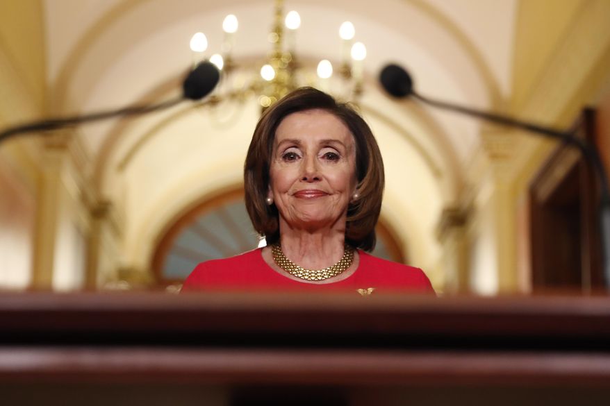 House Speaker Nancy Pelosi of Calif., arrives to speak outside her office on Capitol Hill, Monday, March 23, 2020. (AP Photo/Andrew Harnik, Pool)