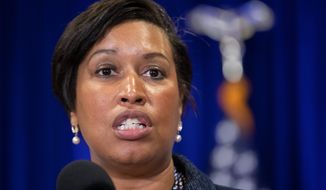 &quot;We have virtually shut down economic activity in our city in an effort to contain the spread of the virus,&quot; D.C. Mayor Muriel Bowser said at a press conference on Tuesday. (Associated Press)