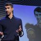 Michael Phelps speaks during a Panasonic news conference before the CES tech show, Monday, Jan. 6, 2020, in Las Vegas. (AP Photo/John Locher)