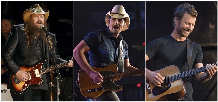 This combination photo shows country music stars, from left, Chris Stapleton, Brad Paisley and Dierks Bentley performing in concert. The multibillion-dollar concert industry halted after the outbreak of novel coronavirus in the United States. Now thousands of small businesses and contract workers who live gig to gig are facing an uncertain future. (AP Photo)
