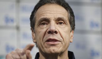 New York Gov. Andrew Cuomo speaks during a news conference at the Jacob Javits Center that will house a temporary hospital in response to the COVID-19 outbreak, Tuesday, March 24, 2020, in New York. (AP Photo/John Minchillo) ** FILE **