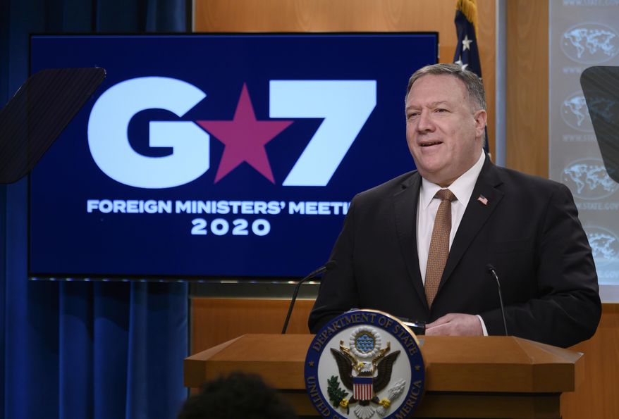 Secretary of State Mike Pompeo speaks during a news conference at the State Department on Wednesday, March 25, 2020, in Washington. Mr. Pompeo said Wednesday that the Group of Seven members were all aware of China&#39;s &quot;disinformation campaign&quot; regarding the coronavirus outbreak, as the two countries dispute the origins of the disease. (Andrew Caballero-Reynolds/Pool Photo via AP)
