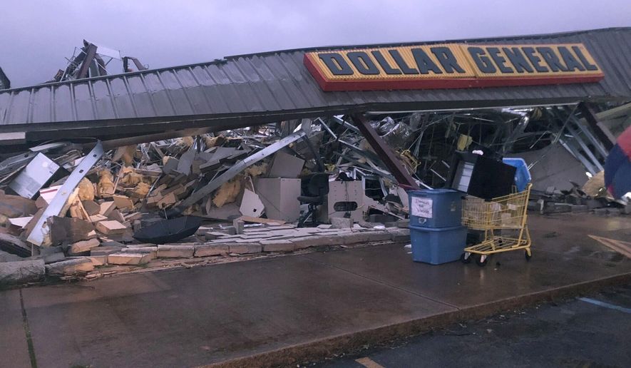In this Tuesday, March 24, 2020 photo, a Dollar General store in Tishomingo, Miss., is completely destroyed after a suspected tornado swept through the area. (Kayla Thompson/WTVA via AP)