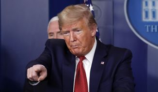 President Donald Trump takes questions during a briefing about the coronavirus in the James Brady Briefing Room, Wednesday, March 25, 2020, in Washington. (AP Photo/Alex Brandon)