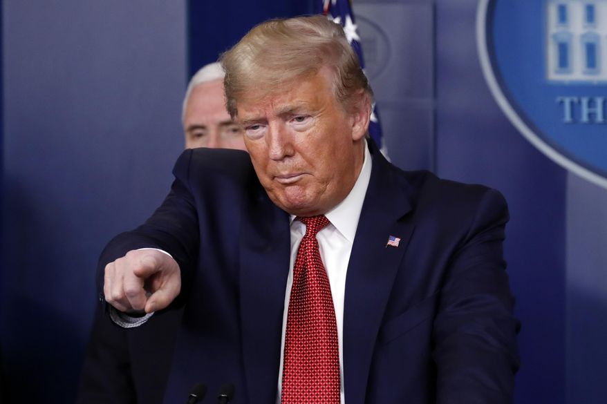 President Donald Trump takes questions during a briefing about the coronavirus in the James Brady Briefing Room, Wednesday, March 25, 2020, in Washington. (AP Photo/Alex Brandon)